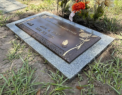 Bronze plaque on granite base — after cleaning